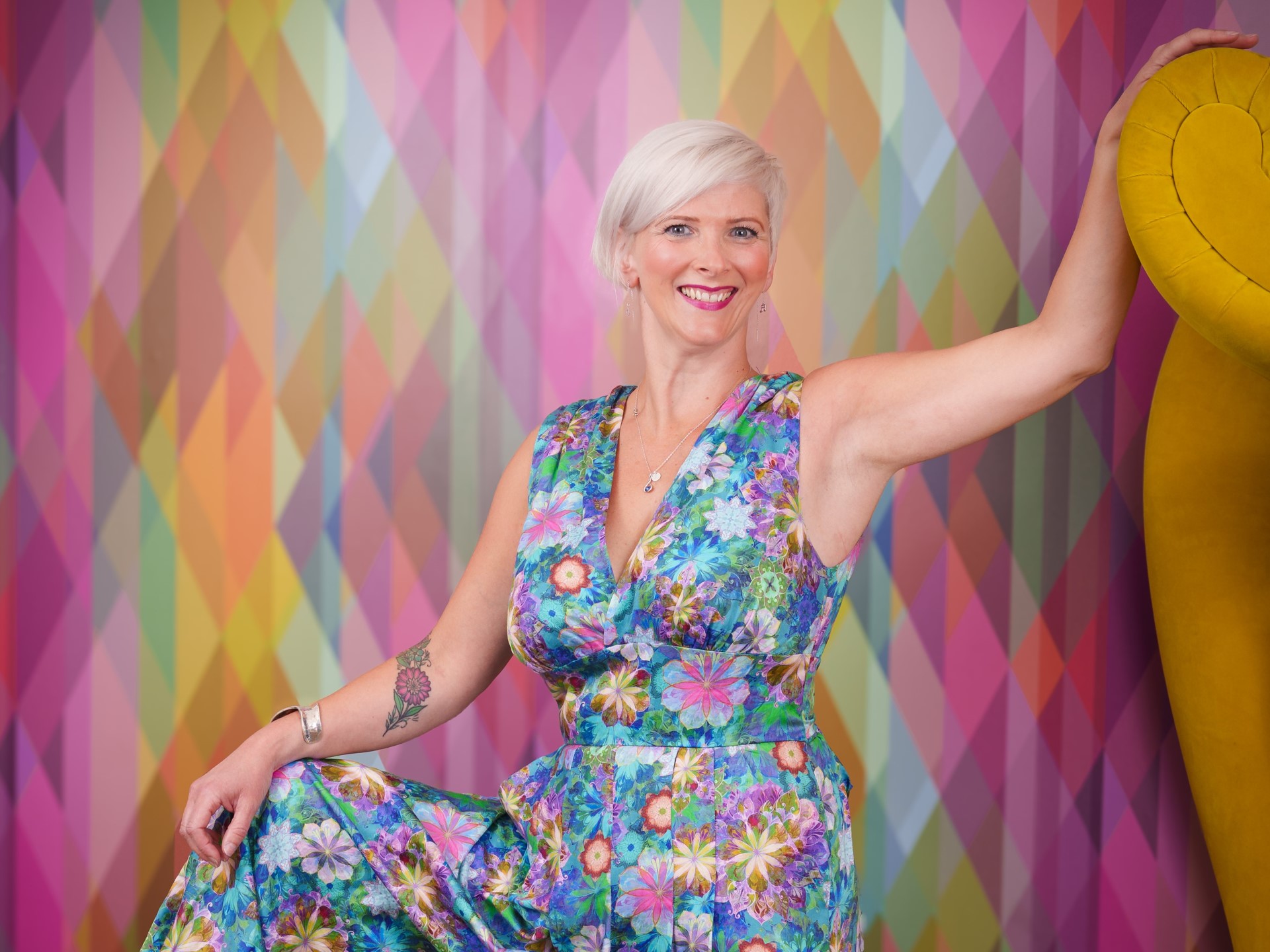 Emma Morwood standing with couch